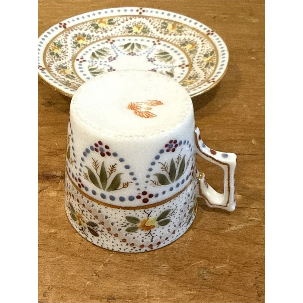 Antique Austrian demitasse cup and saucer hand painted floral gold trim